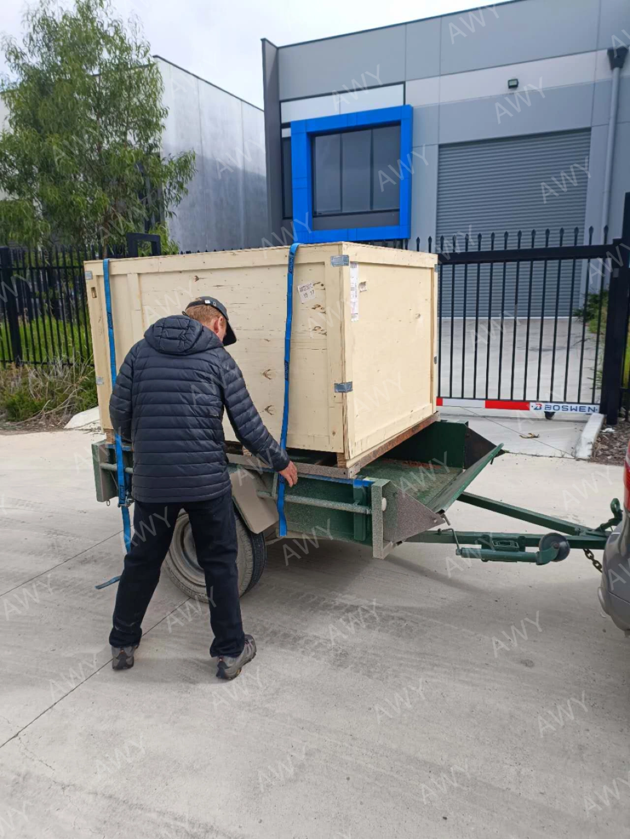Delivery crate being unloaded at customer site