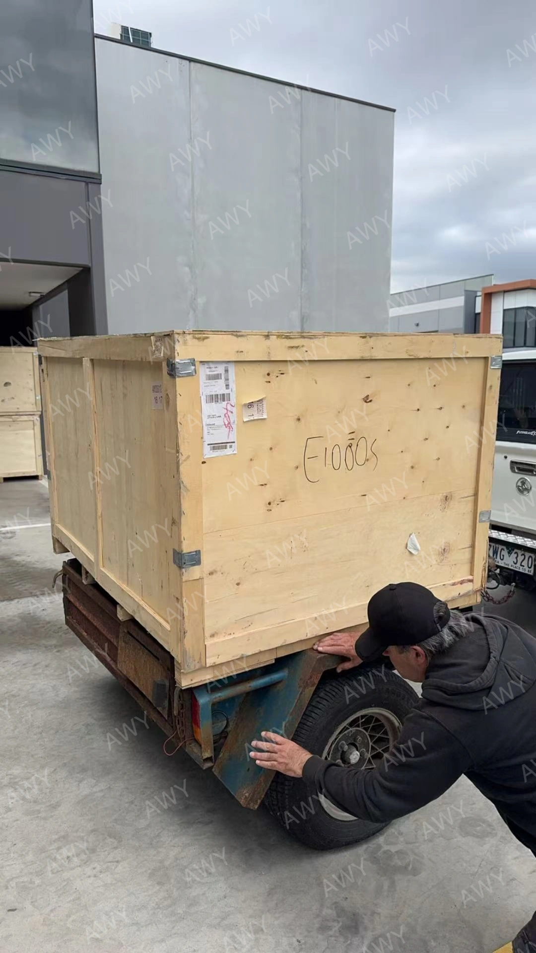 Customer trailer loaded with mower delivery crate
